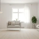 Jasny salon w stylu skandynawskim z drewnianą podłogą, białymi ścianami i minimalistycznymi meblami